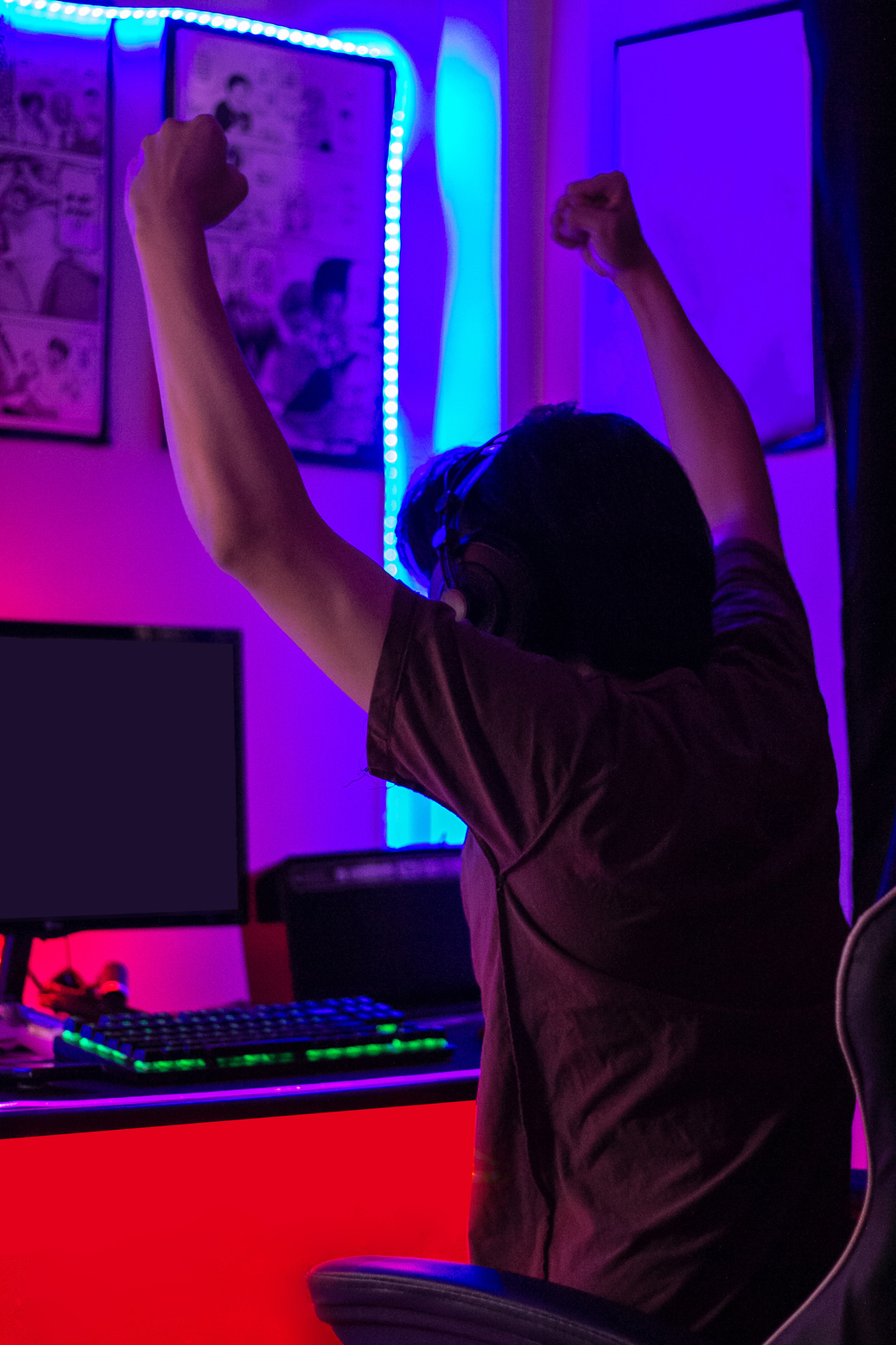Happy Male Gamer Celebrating Success in the Game